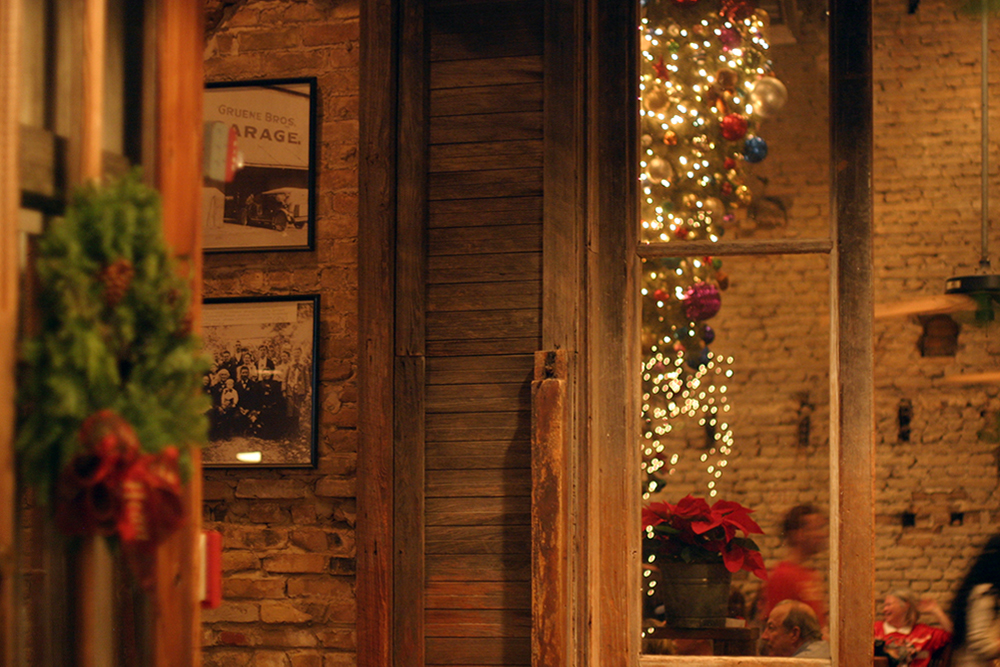 A peek inside the windows of The Gristmill in Gruene Texas at their famous upside-down Christmas tree. 