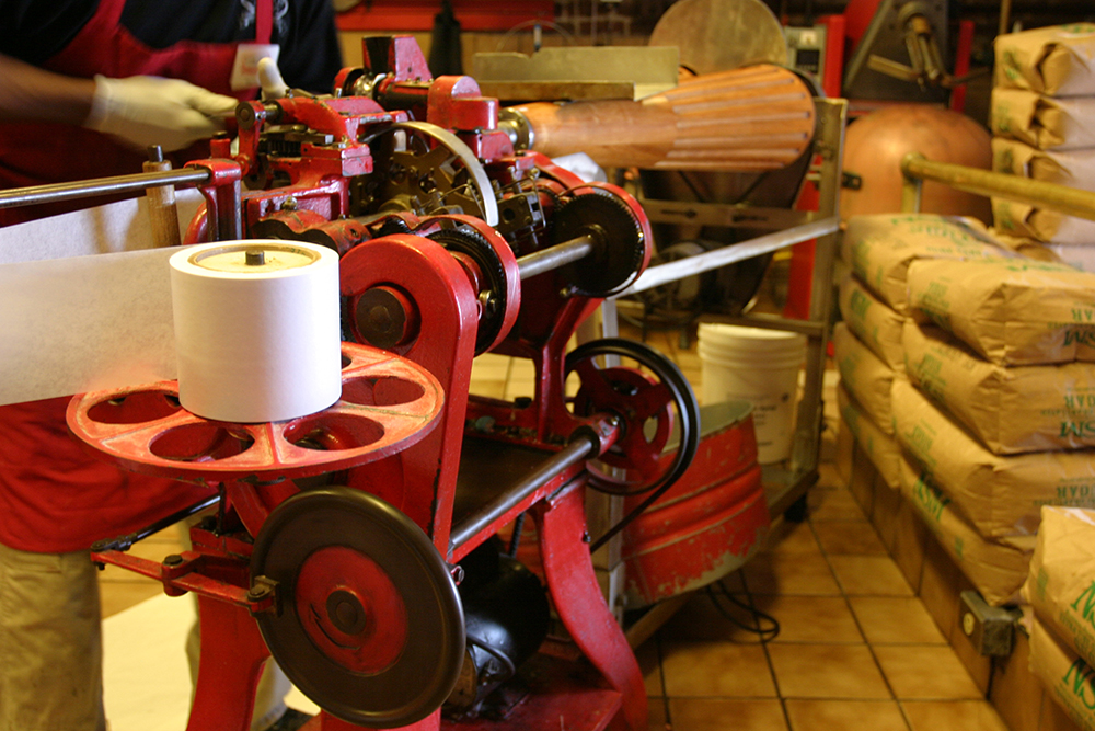 River Street Sweets Savannah GA: Visit them for a free sample of their world famous pralines, then watch candy being made from scratch inside the store. The almost 100-year-old machine used to individually wrap the salt water taffy. 