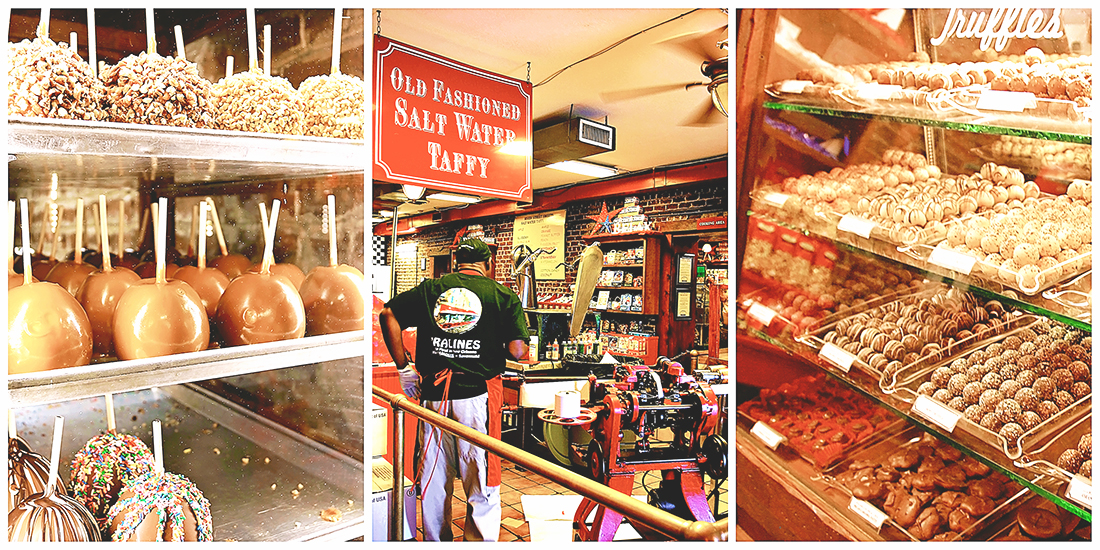 Caramel and candy-covered apples, an employee working to make salt-water toffee, and an antique display case of truffles all located inside River Street Sweets on River Street in Savannah, GA.