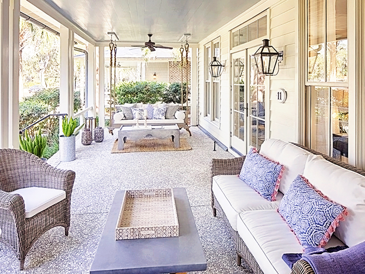 The front porch on this home is the perfect spot to relax with a glass of sweet tea and enjoy the Lowcountry breeze. | Vacation Rentals Bluffton SC | Photo ©Homeaway