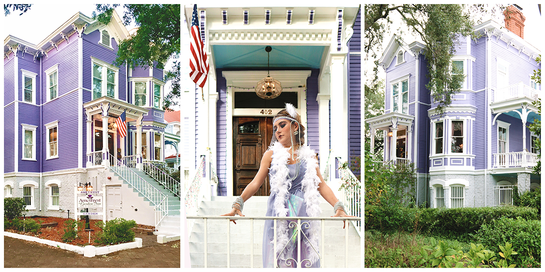 3-story purple Victorian-style home with white trim. The front door has a very detailed and intricate porch cover with touches of cream-colored and haint blue paint, and a girl in a lavender flapper-style dress is standing on the tall stairs leading to the entry.