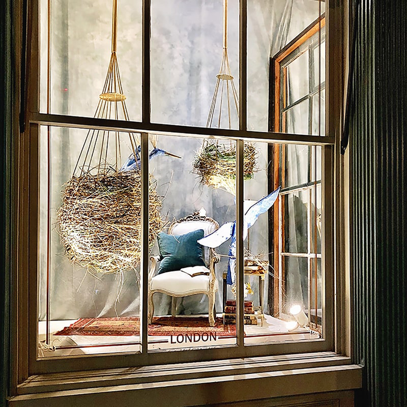 Elaborate window display at The Paris Market in Savannah.