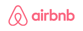 airbnb LOGO in a coral pinkish color